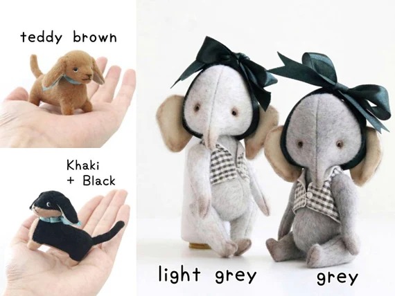 Handcrafted plush elephants in light grey and grey with green bows and checked outfits, and small plush dogs in teddy brown and khaki with black.