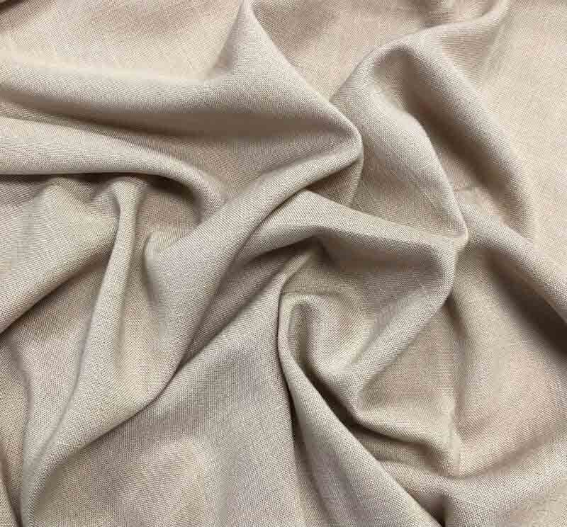 Light beige soft fabric texture close-up.