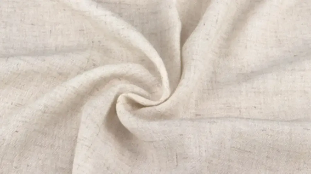 Unbleached cotton fabric with soft texture and visible weave.