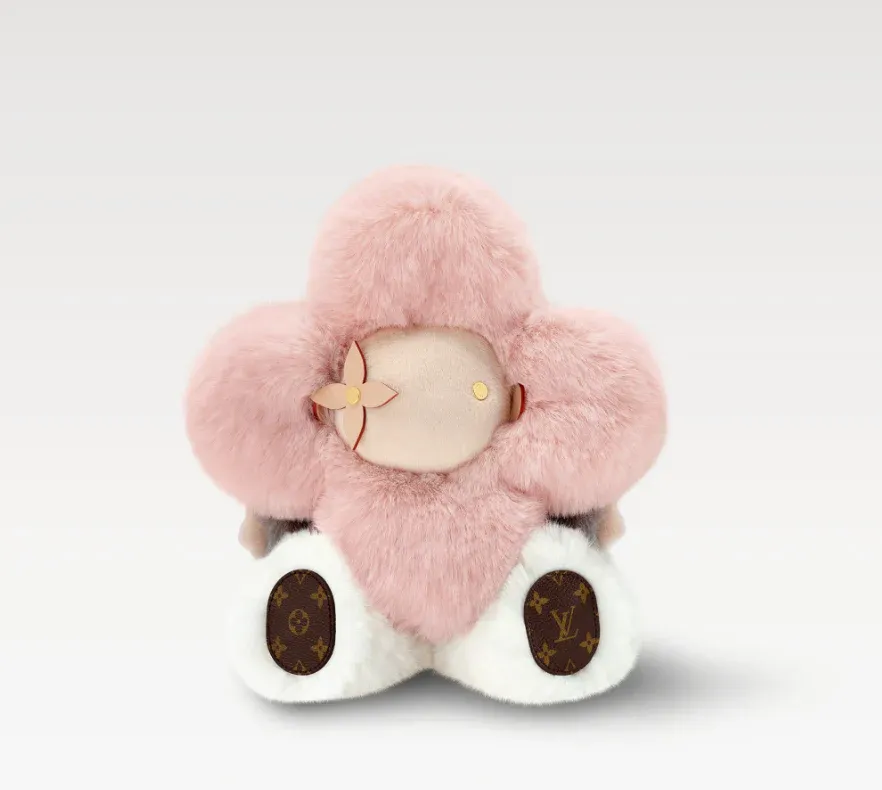 Pink plush flower doll with designer details