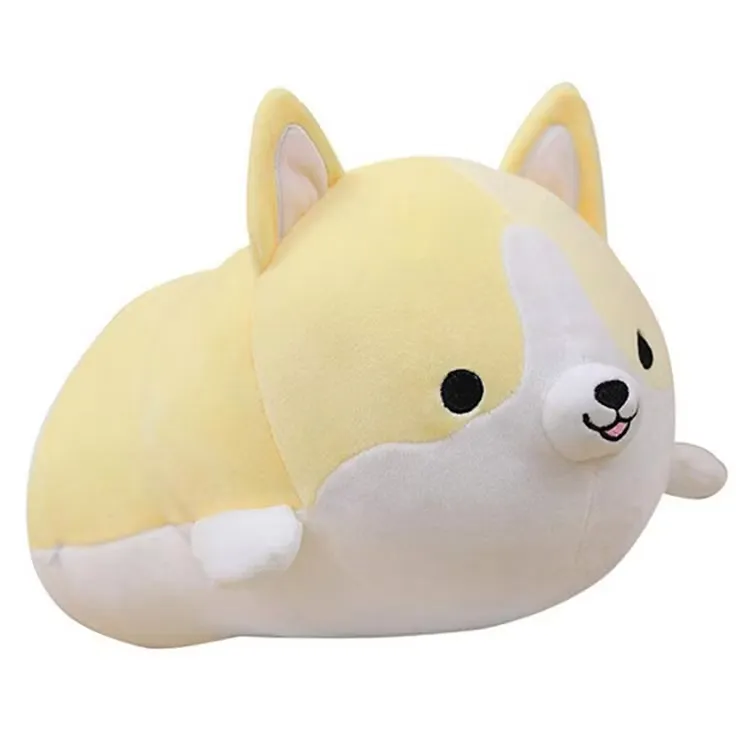 Ein rundes, gelb-weißes Corgi-Plüschtier mit einem fröhlichen Gesicht und aufrechten Ohren auf weißem Hintergrund.