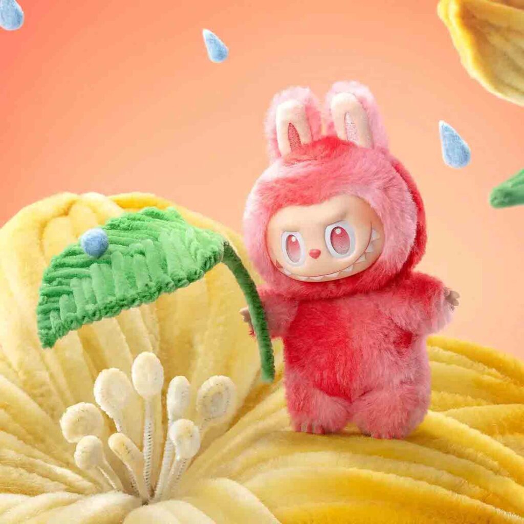 Peluche Labubu rose avec parapluie en forme de feuille