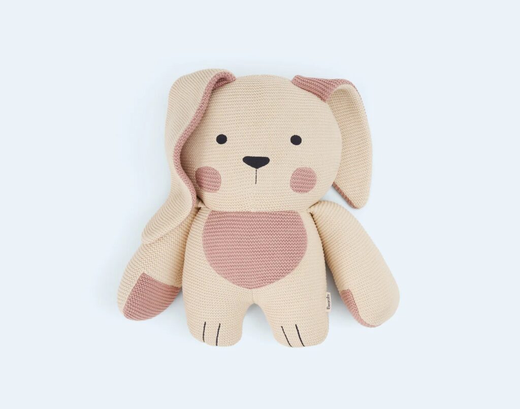 Beige knit stuffed dog with floppy ears