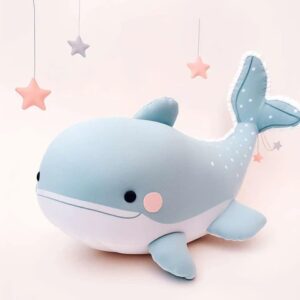 Large blue whale plush with star decorations