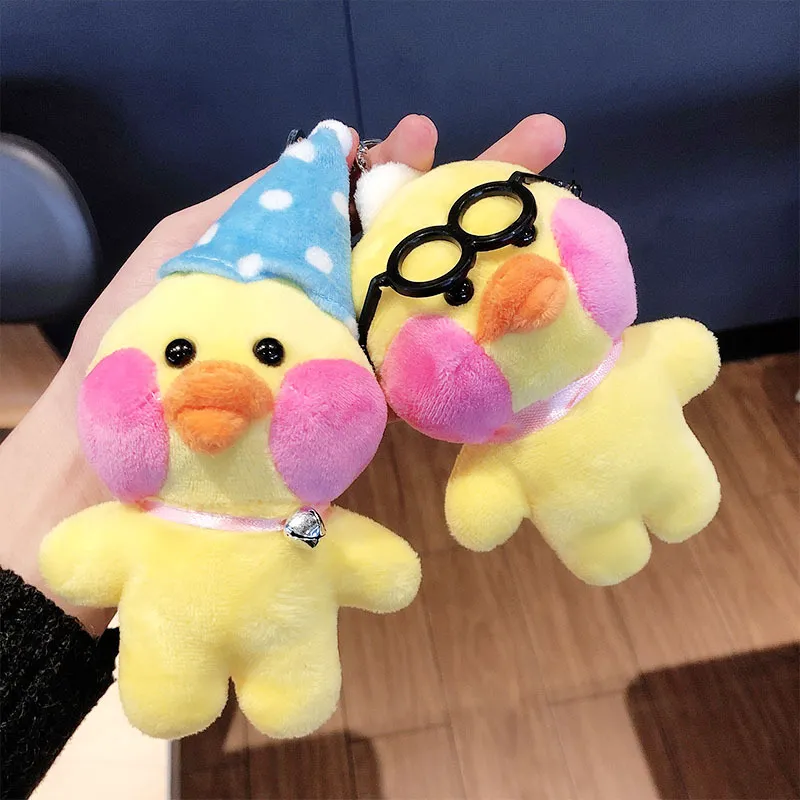Yellow plush chicks with pink cheeks and accessories keychain