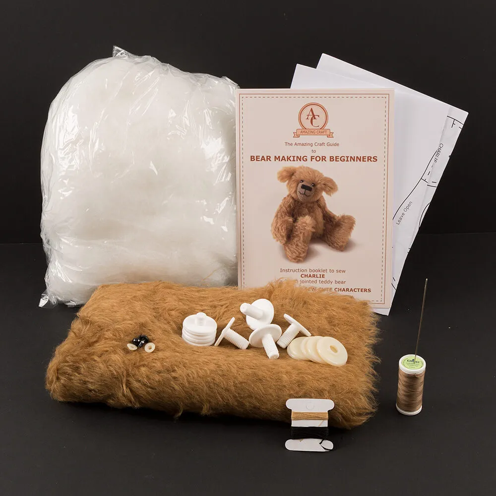 DIY bear making kit including faux fur fabric, stuffing, thread, needles, eyes, joints, and instruction booklet.