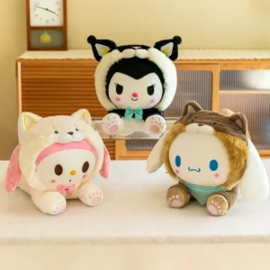 Three plush toys dressed as animals on table