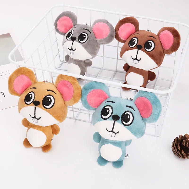 Four colorful plush mouse keychains in a white basket