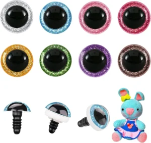 Glittery plastic safety eyes for plush toys in various colors with example toy shown