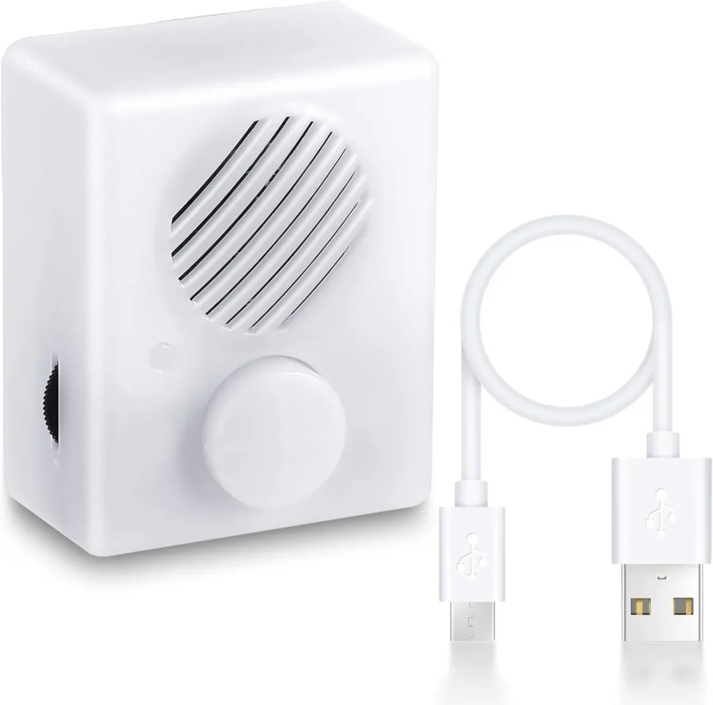White compact voice recorder device with volume knob and USB charging cable.