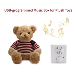 Plush teddy bear with striped sweater and white USB music box with music notes.