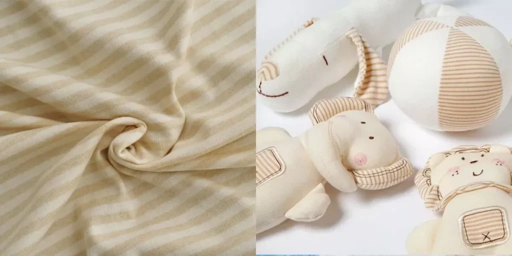 Soft striped cotton fabric with beige plush animal toys.