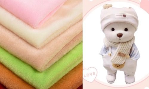 Plush Toy Fabric Color Options and Finished Bear Doll Various pastel and vibrant plush fabrics stacked on the left, with a dressed bear plush toy wearing a scarf and hat displayed on the right.